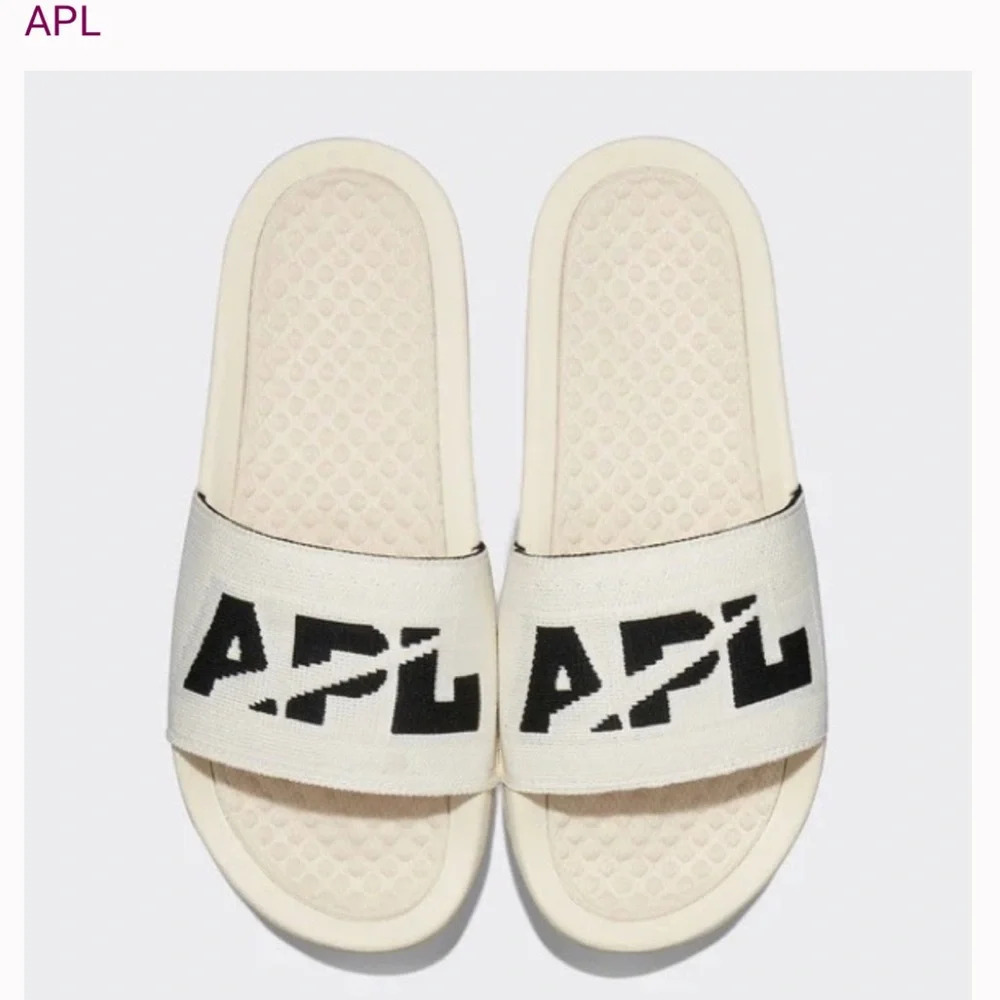 APL: Athletic Propulsion Labs Women's Big Logo Techloom Slide, Pristine/Black,11